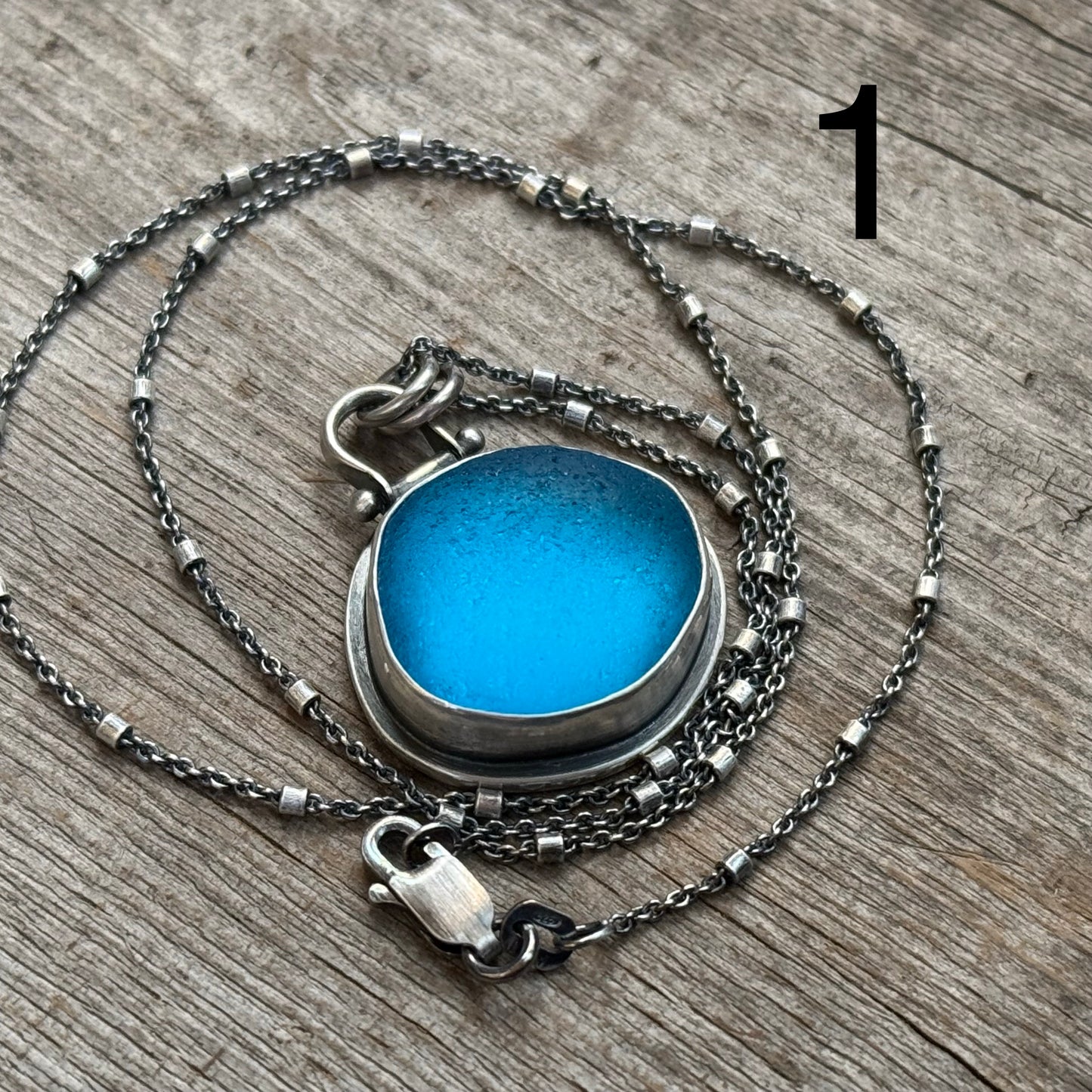 Changing Tides Genuine Sea Glass Pendant (wave on reverse)