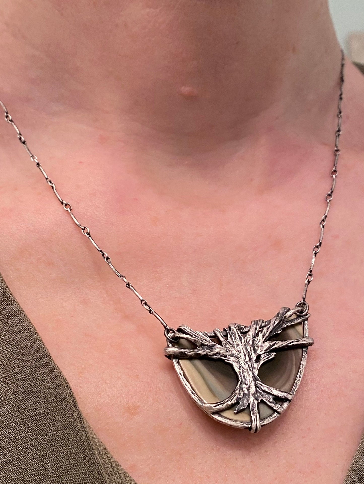 Hand carved sterling silver pendant with Imperial Jasper