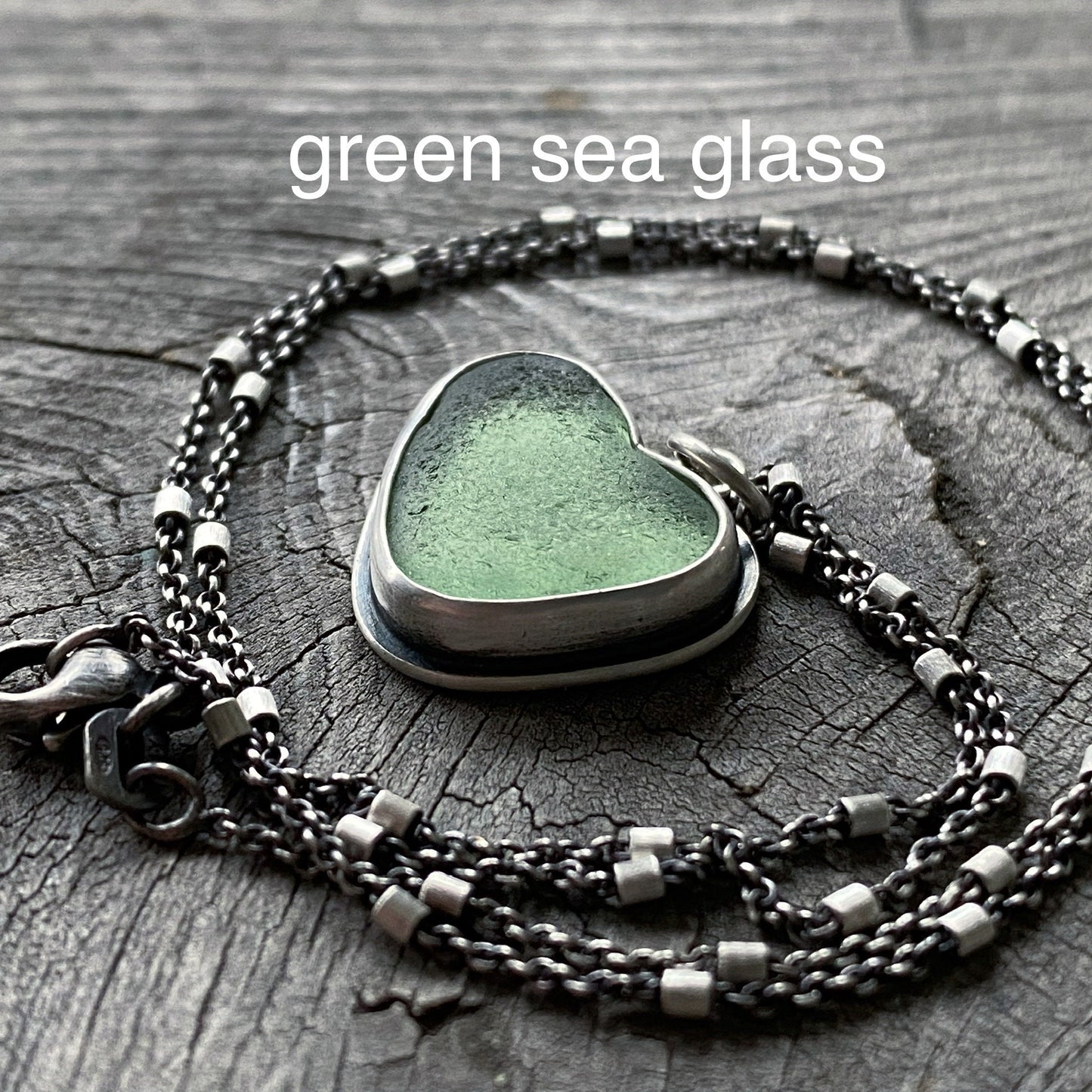 Sterling silver beach stone heart pendants