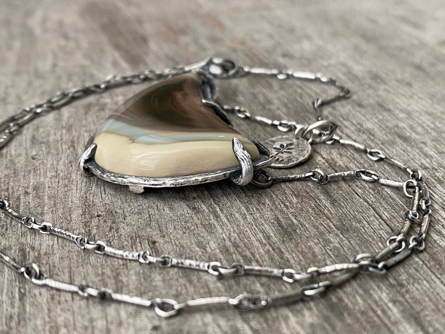 Hand carved sterling silver pendant with Imperial Jasper