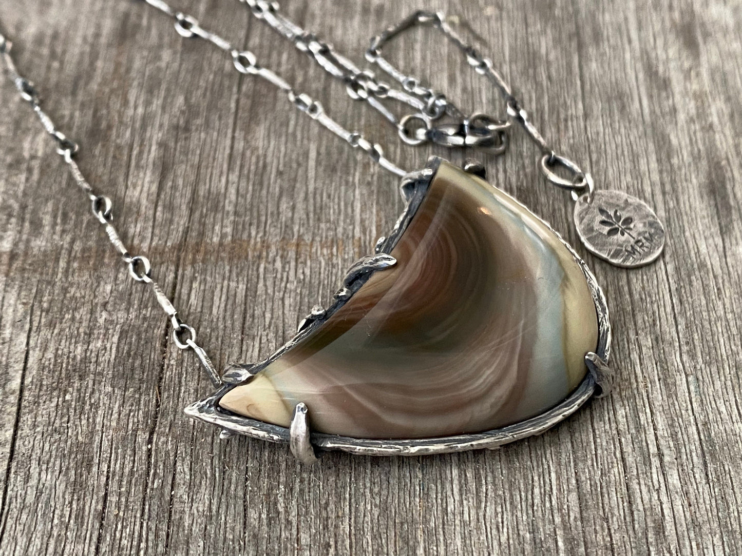 Hand carved sterling silver pendant with Imperial Jasper
