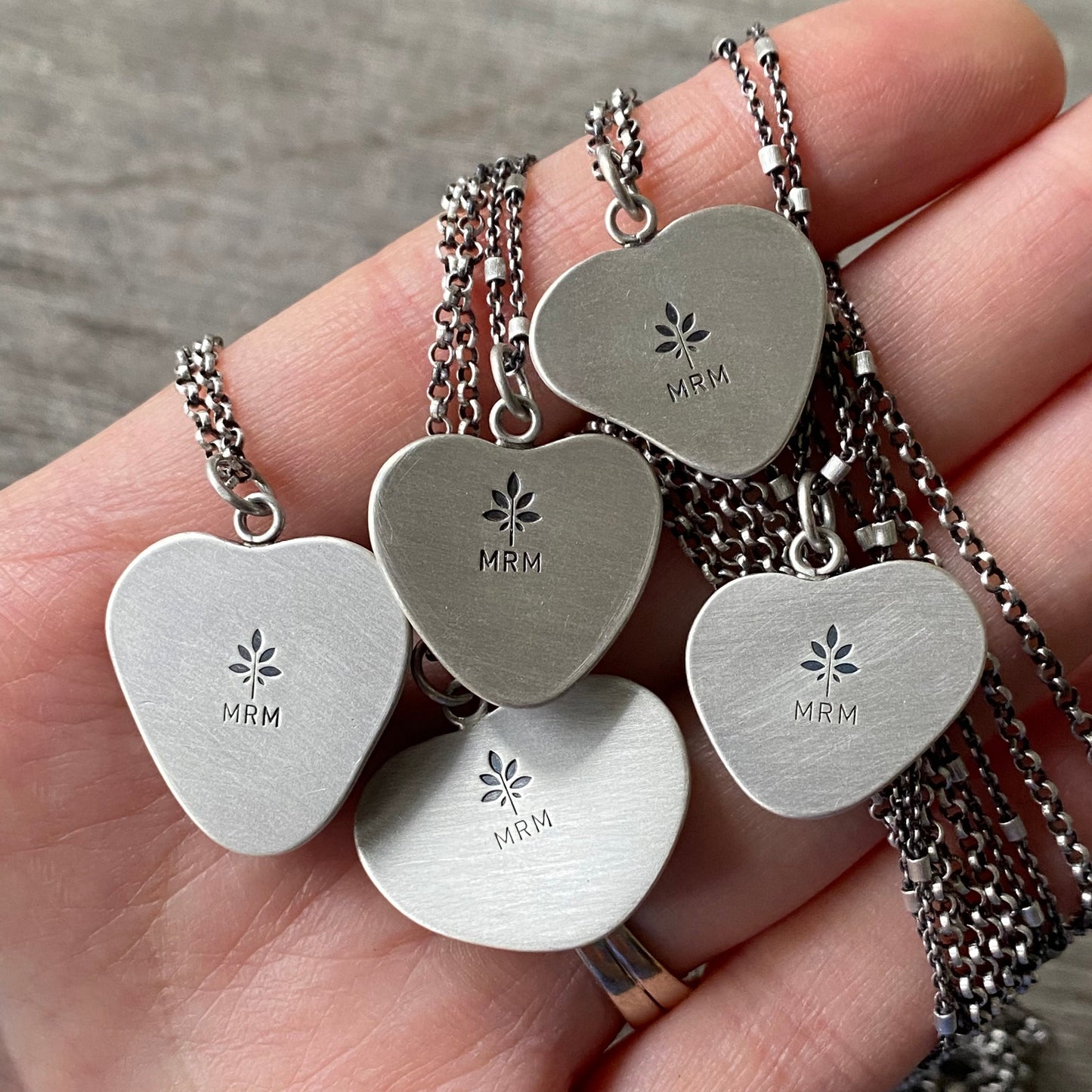 Sterling silver beach stone heart pendants