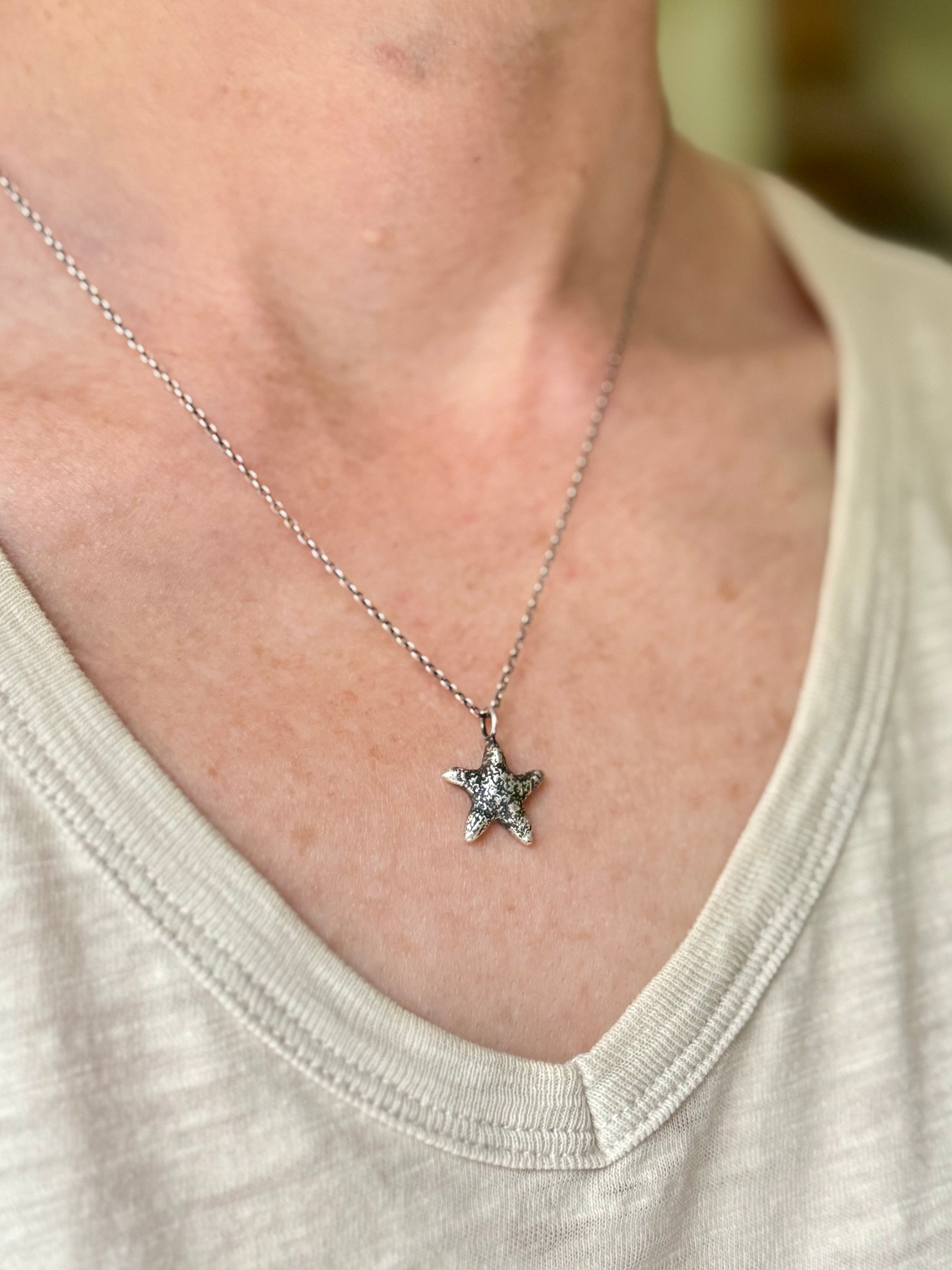 Oregon Sea Star Sterling Silver Necklace as it looks when you wear it.