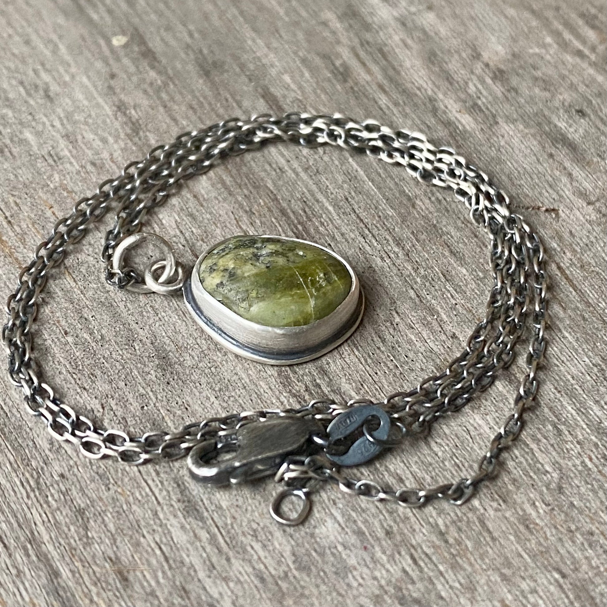 green beach stone and sterling silver pendant