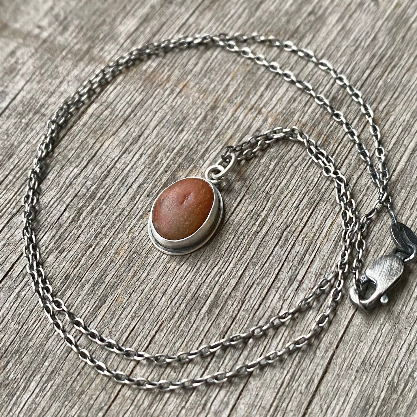 Reddish Brown Tiny Beach Stone Pendant