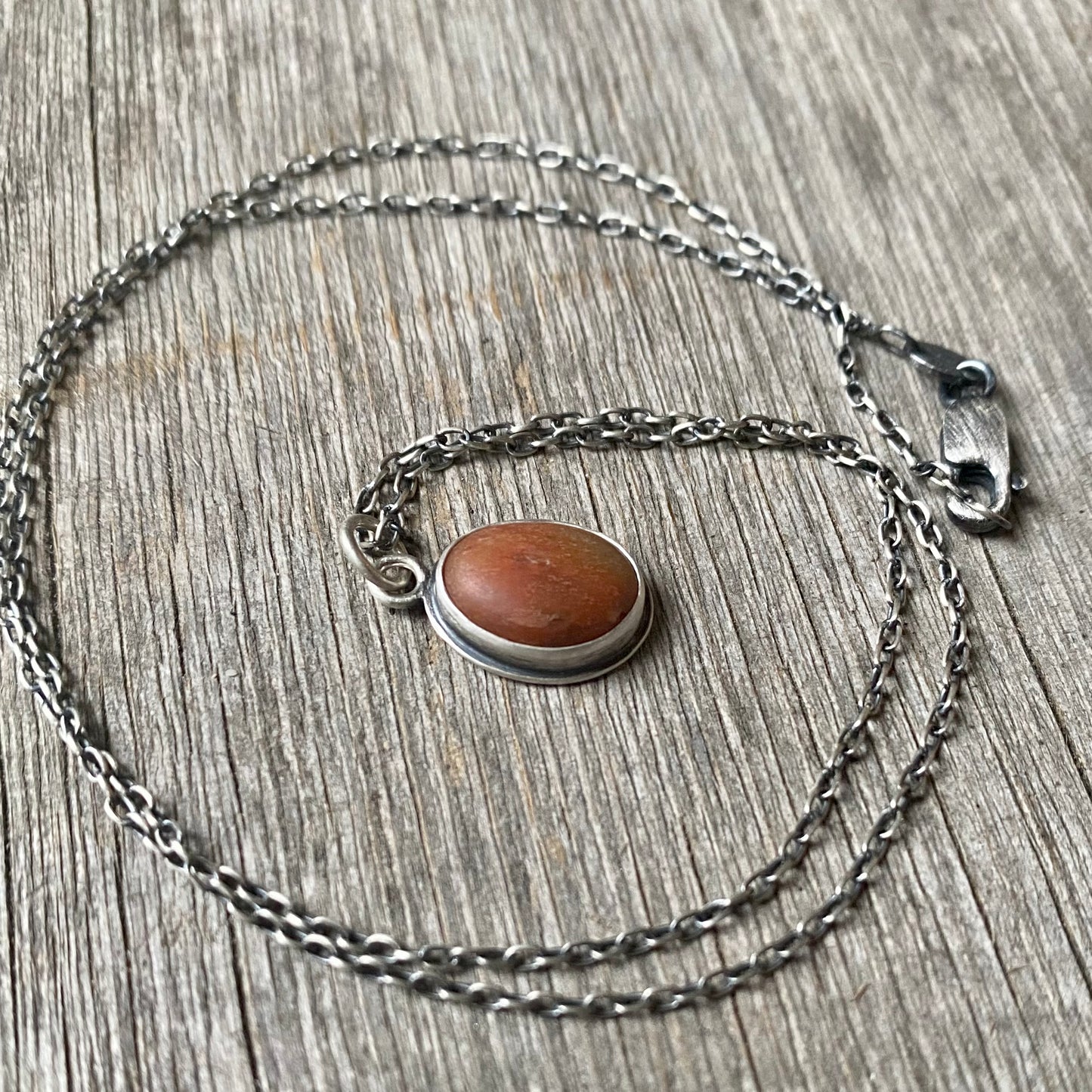 Reddish Brown Tiny Beach Stone Pendant